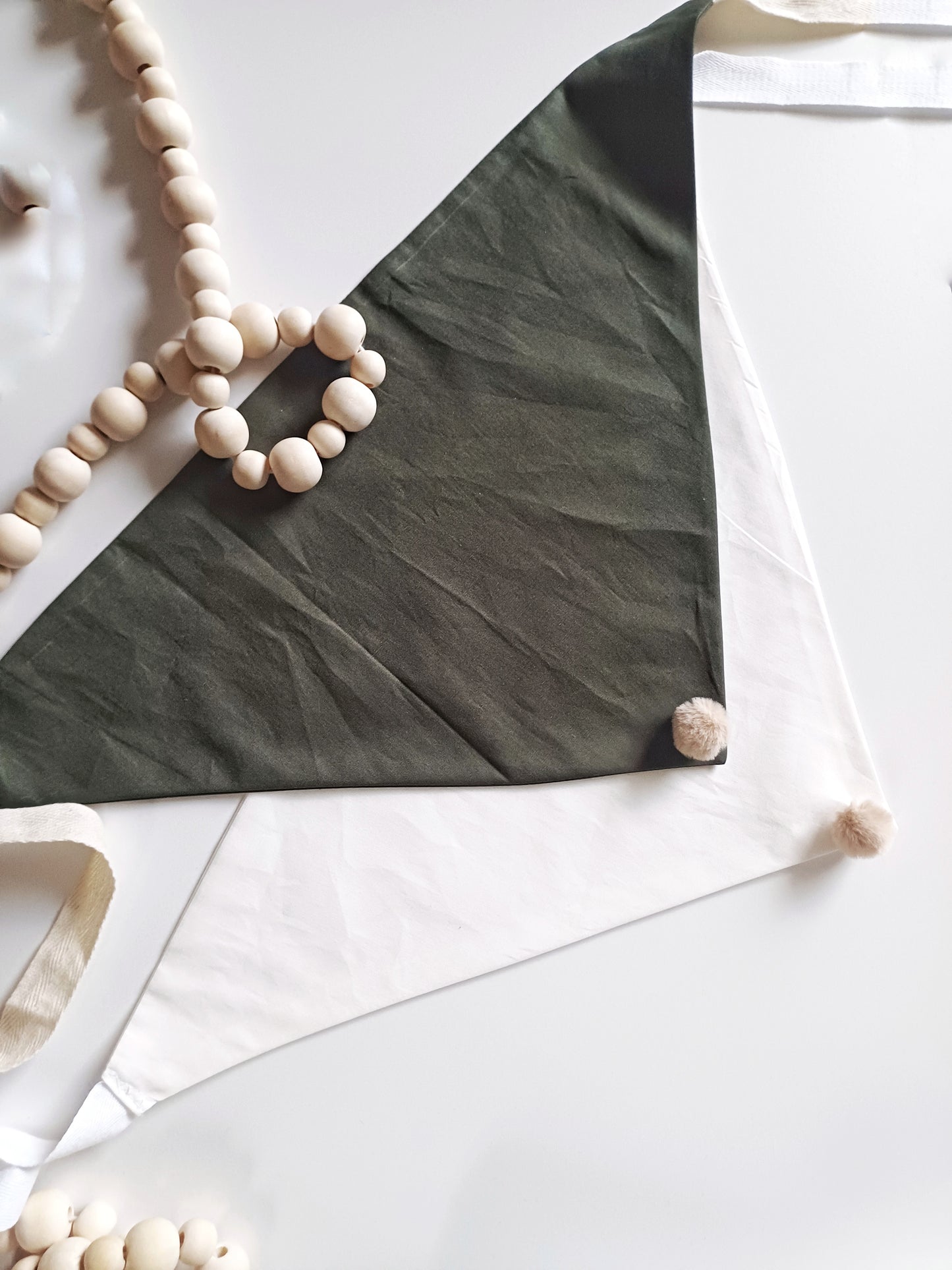 Noémie, the small plain scarves with pompoms