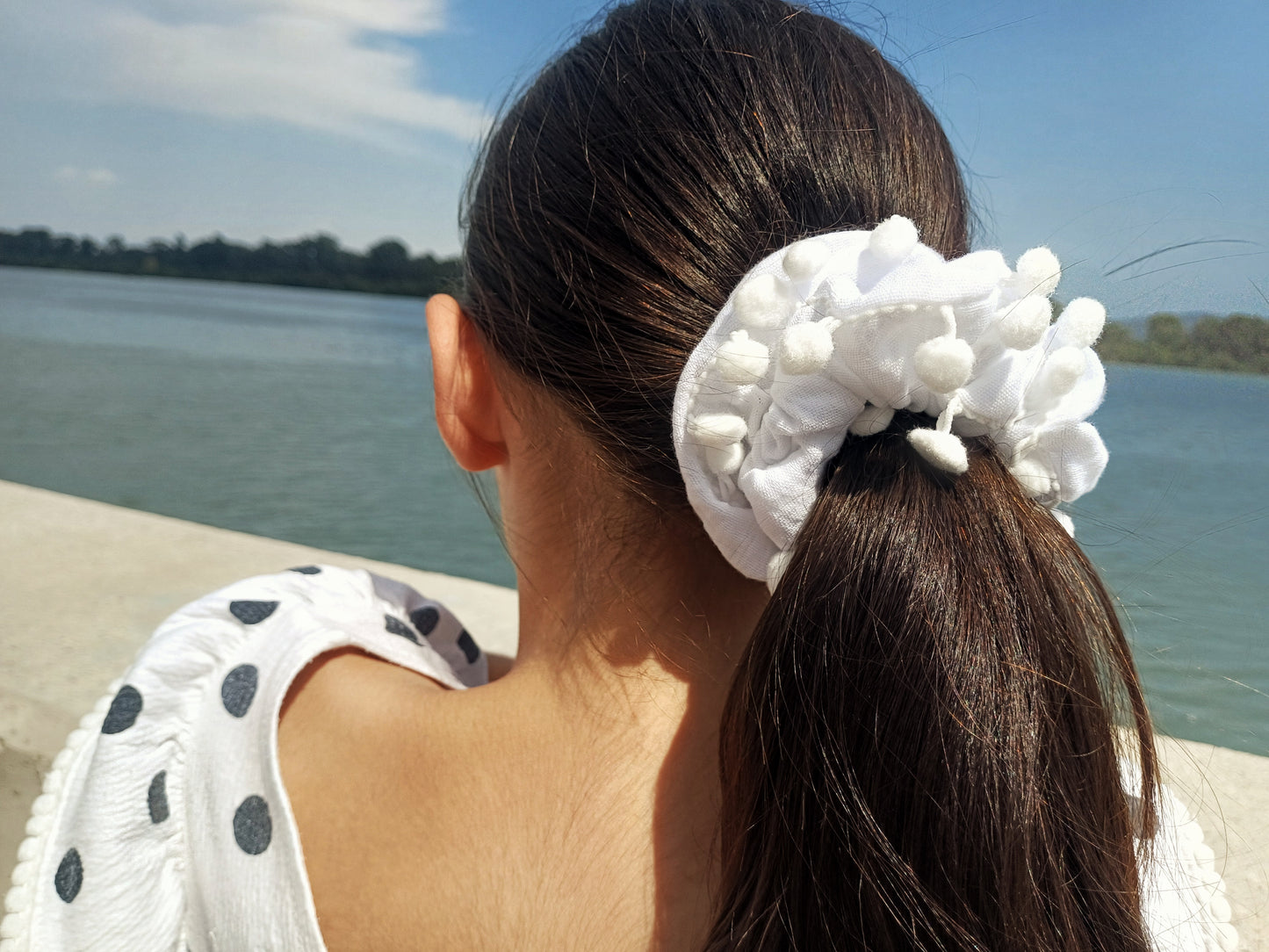 Candice, the pompom scrunchie