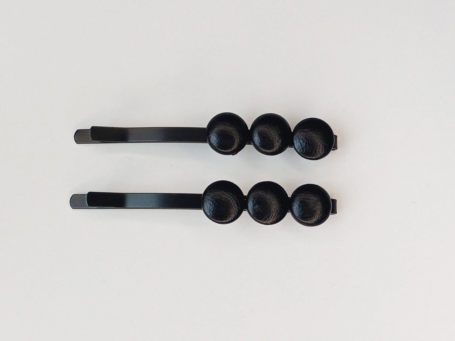 Dakota, les hair slides cuir